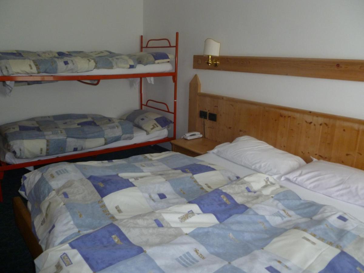 Hotel Alpenrose Passo Rolle Rum bild
